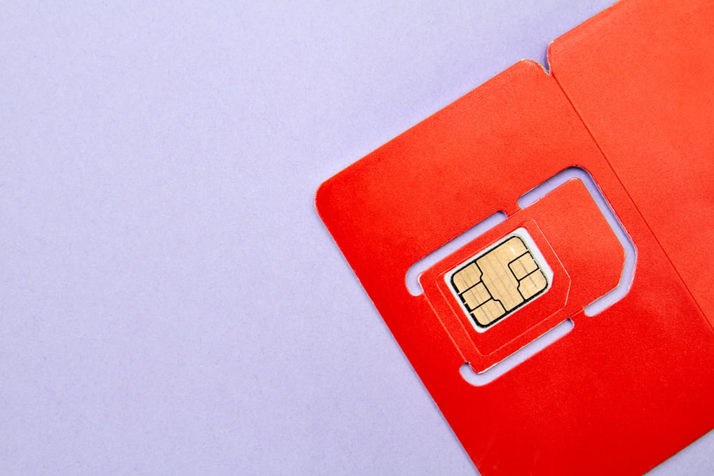 Sim Card for Mobile Phone on Purple Background